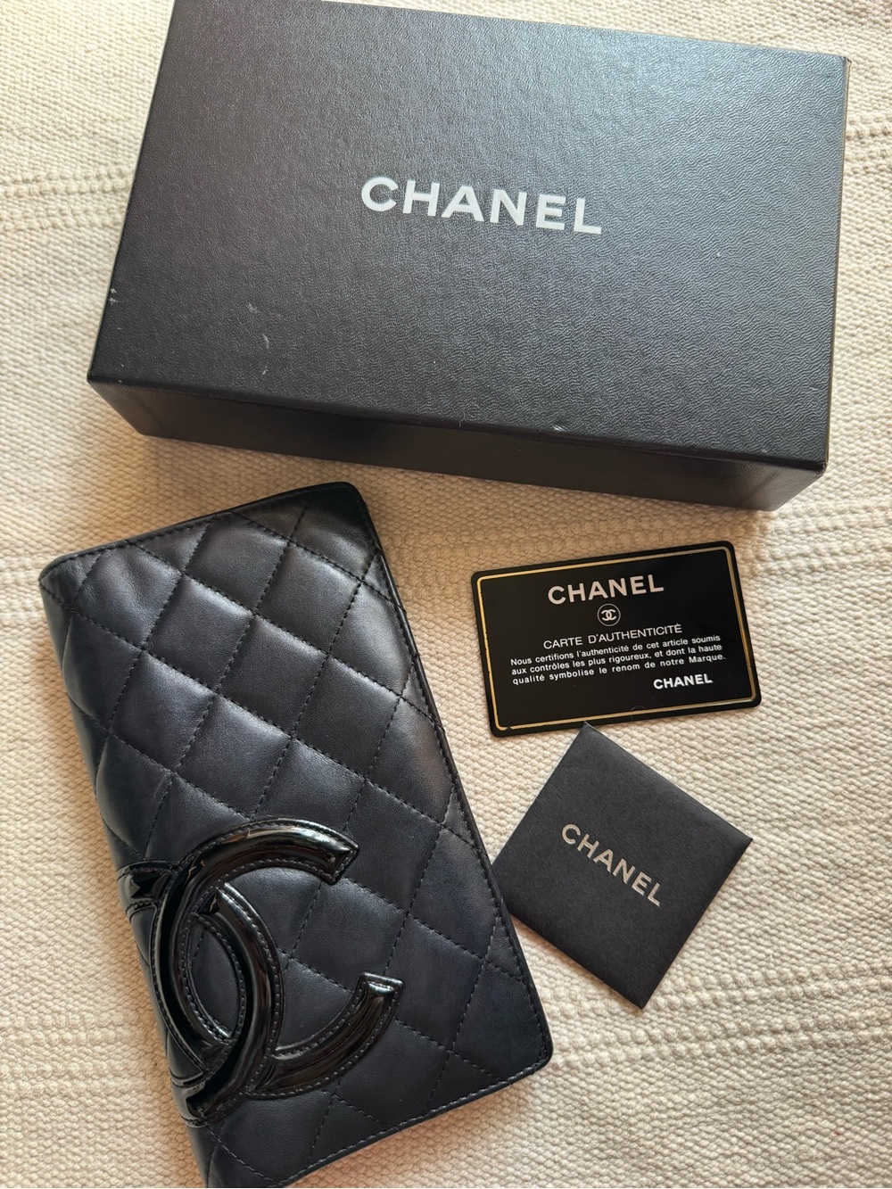 CHANEL Black Quilted Leather Phone Case with CC Logo